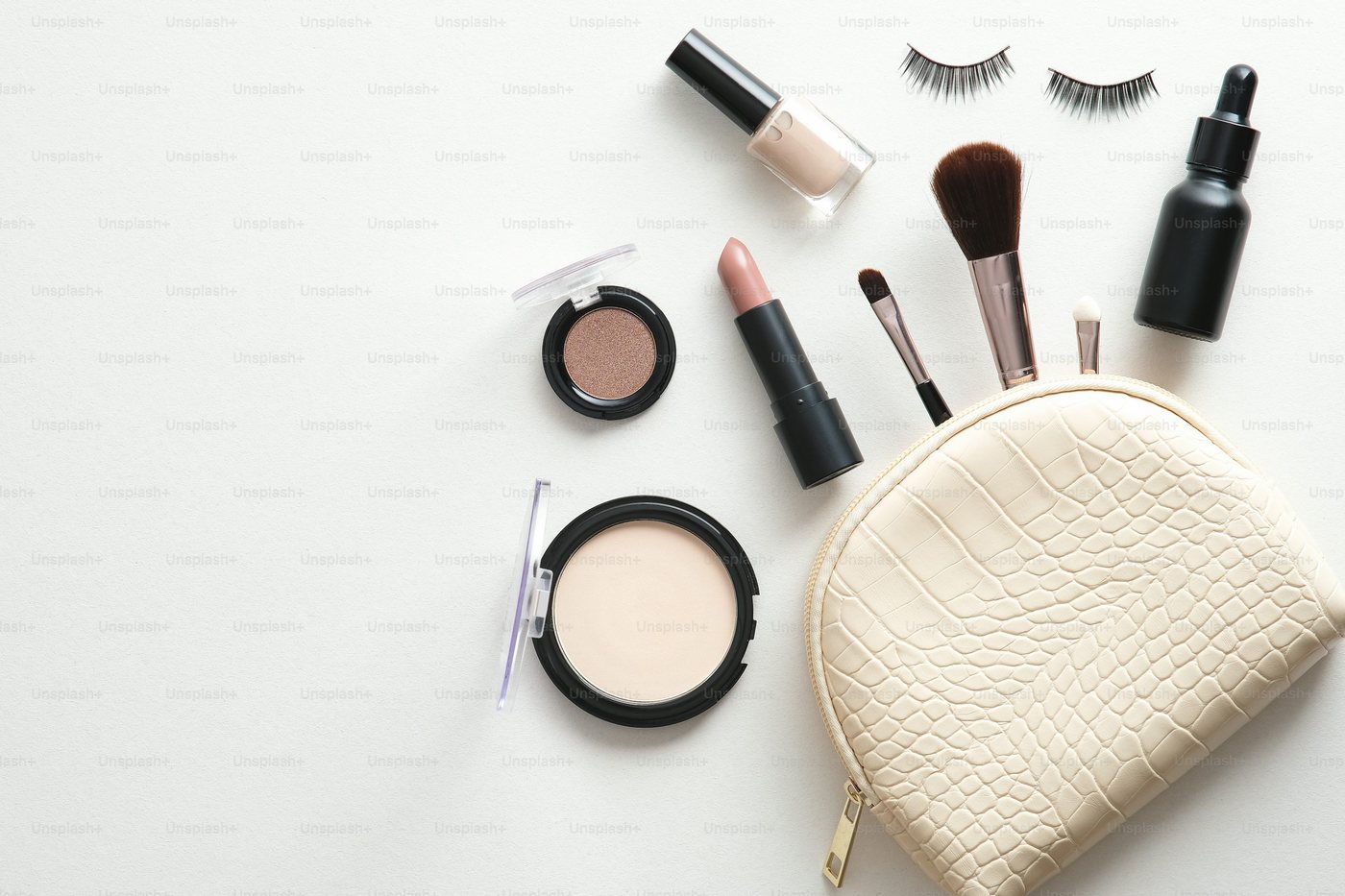 Illustrative flat lay of makeup products